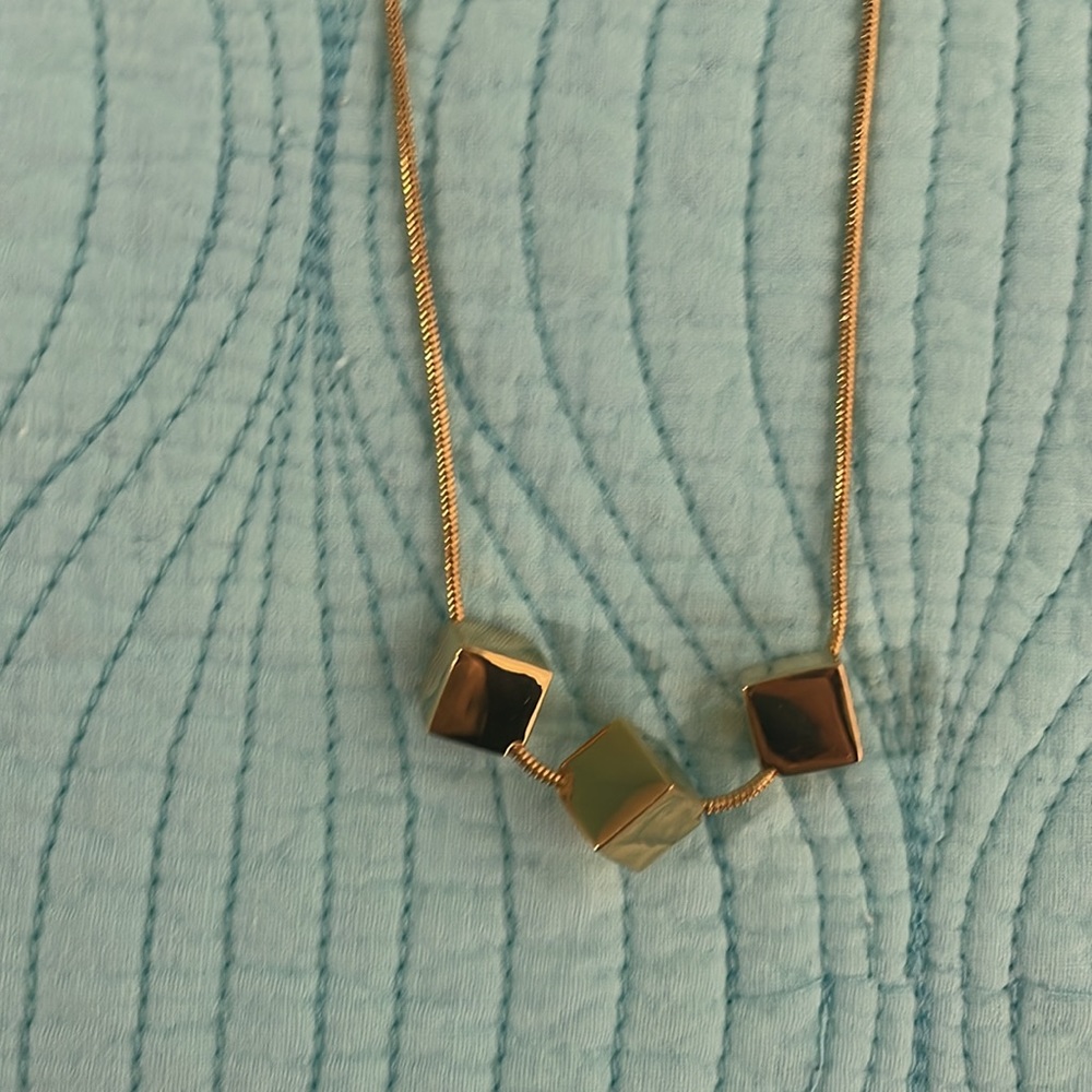 Trina Turk gold tone 3 cubes / squares necklace